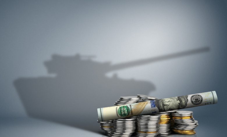 Military Budget Concept, Banknote With Weapon Shadow